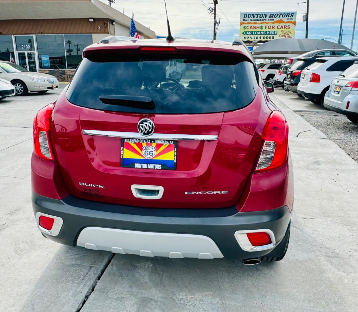 2014 Red Buick Encore (KL4CJCSB2EB) , located at 2190 Hwy 95, Bullhead City, AZ, 86442, (928) 704-0060, 0.000000, 0.000000 - 2014 Buick encore . Leather loaded . Moonroof , Bluetooth . Backup camera . - Photo#4